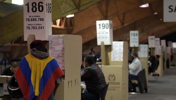 Descubrir dónde votar en las elecciones presidenciales es la interrogante más buscada en internet por los ciudadanos de Colombia. | Foto: AFP