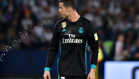 Cristiano Ronaldo y su reacción tras oír: "Messi, Messi, Messi". (Foto: AFP)