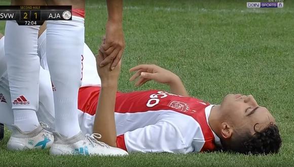 Abdelhak Nouri segundos después de caer desmayado. (Captura de pantalla: YouTube)