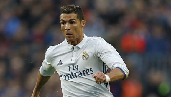De acuerdo con la versión impresa de "Marca", Cristiano Ronaldo confirmó su continuidad en Real Madrid. "Ganar trofeos importantes con mi club el año pasado fue genial", precisó. (Foto: AFP)