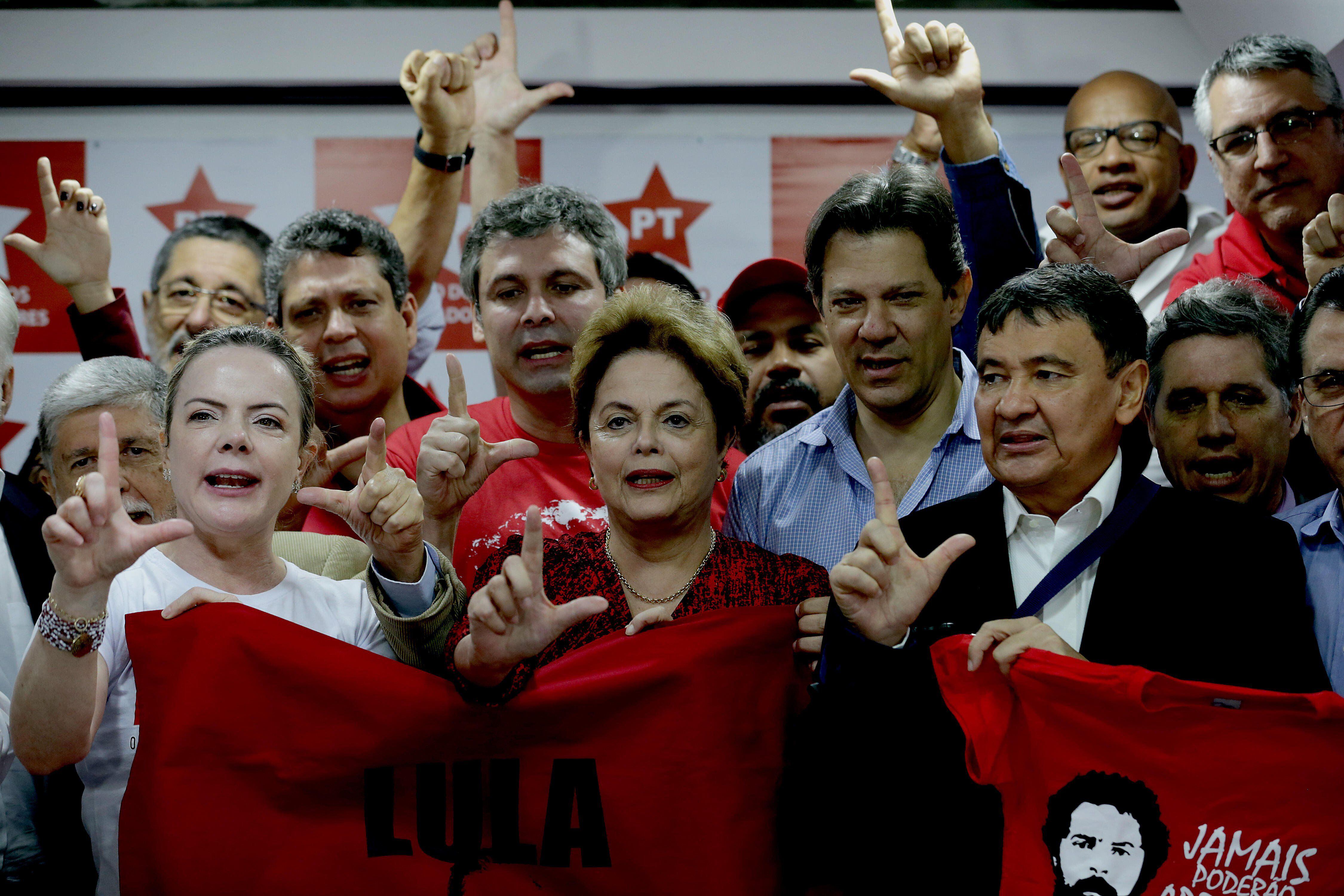 Former Brazilian President Dilma Rousseff (c) poses with supporters during a meeting at the national headquarters of the Workers' Party (PT) in Sao Paulo, Brazil, Monday, July 9, 2018. EFE
