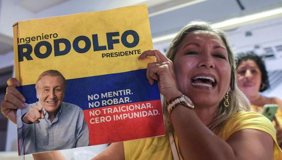 Los partidarios del candidato presidencial Rodolfo Hernández celebran en Cali, Colombia, el 29 de mayo de 2022, después de las elecciones presidenciales. (RAUL ARBOLEDA / AFP).