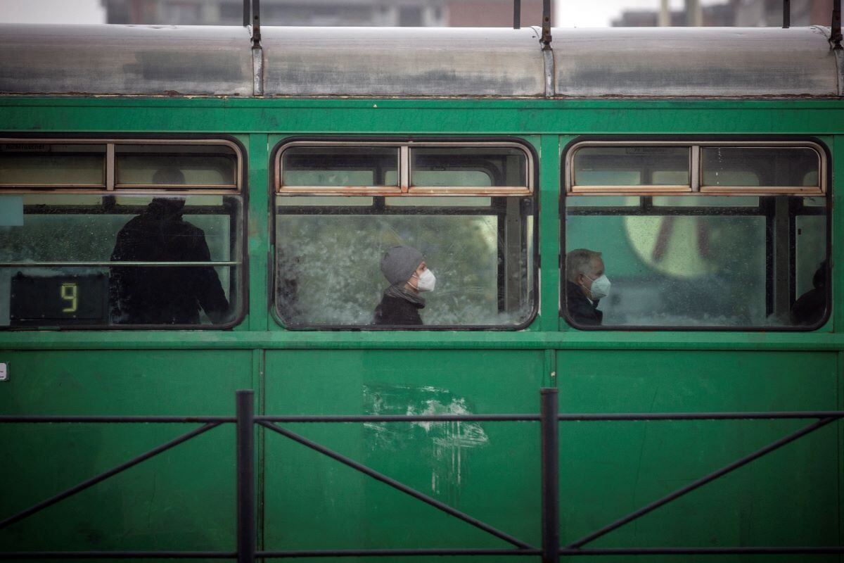 Passengers wearing masks travel by tram in Belgrade on October 11, 2021, amid the coronavirus pandemic.  (OLIVER BUNIC / AFP).