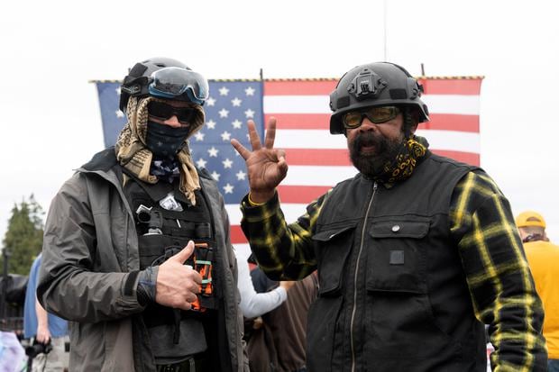 Members of the Proud Boys pose for a photo during a far-right rally on Aug. 22, 2021, in Portland, Oregon.  (Photo: AFP)