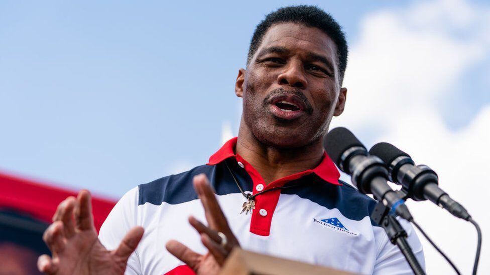 Herschel Walker, a former football player endorsed by Trump, is fighting for a key Republican seat in the Senate.  (GETTY IMAGES).