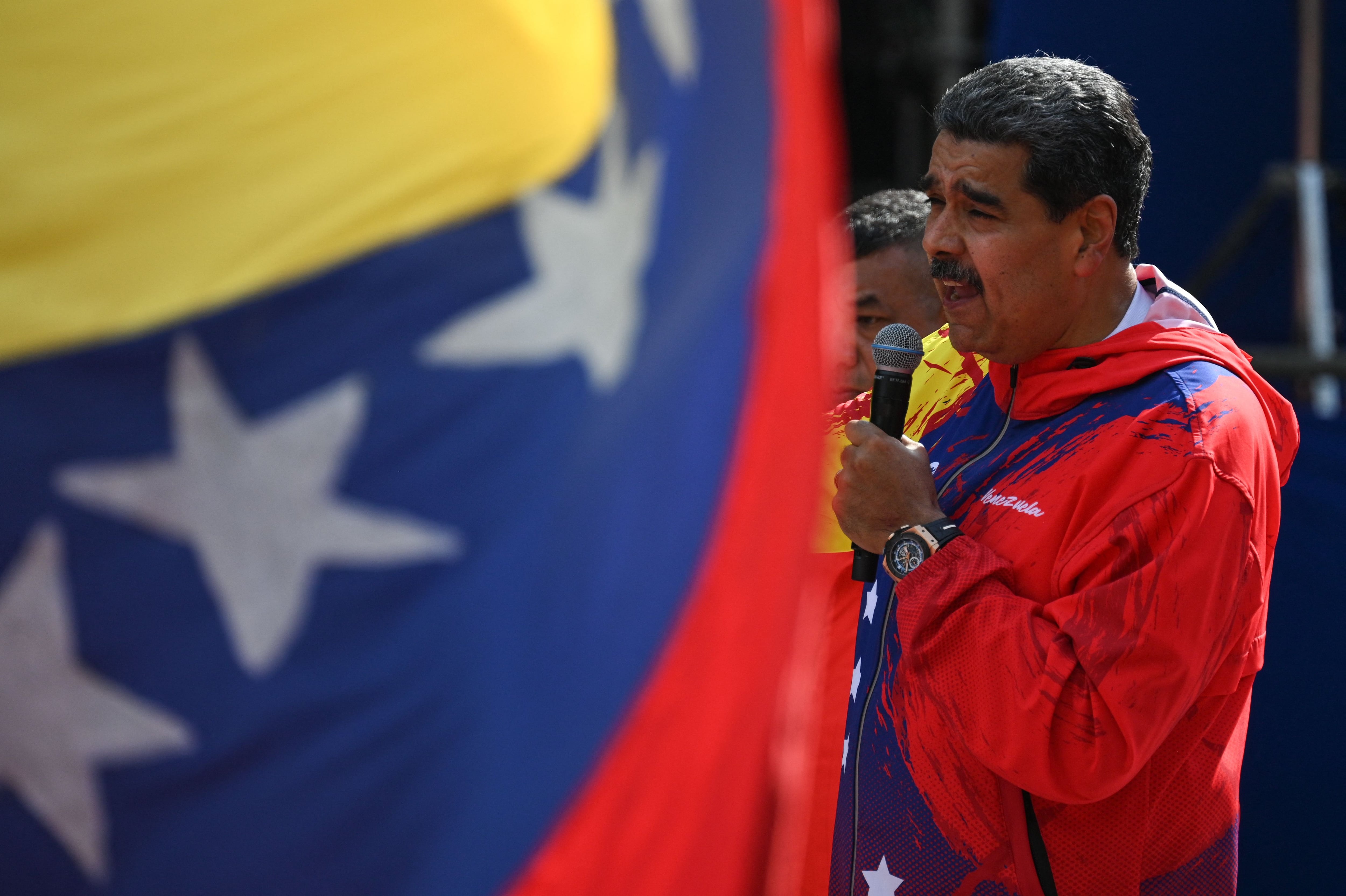 The president of Venezuela, Nicolás Maduro, speaks to his followers during a demonstration commemorating the 20th anniversary of the anti-imperialist declaration by the late former president Hugo Chávez on February 29, 2024. (Photo by Federico PARRA / AFP).