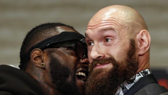 Tyson Fury vs. Deontay Wilder: así fue el tenso careo de los 'pesos pesados' que casi termina a los golpes. (Foto: AFP)