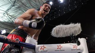 ‘Maravilla’ Martínez retuvo título ante Murray peleando con una sola mano