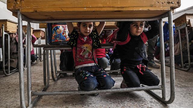 Siria: Niños aprenden desde escuela qué hacer ante un bombardeo - 8