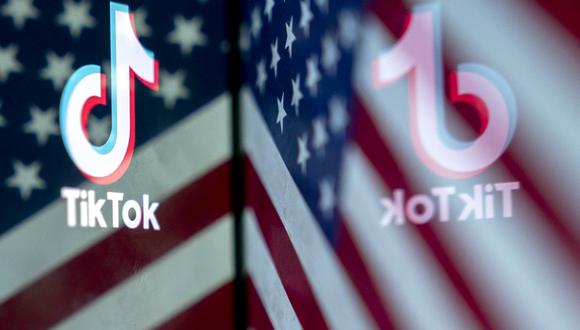 Esta ilustración fotográfica muestra el logotipo de TikTok reflejado en una imagen de la bandera de Estados Unidos en Washington. (Foto: AFP).