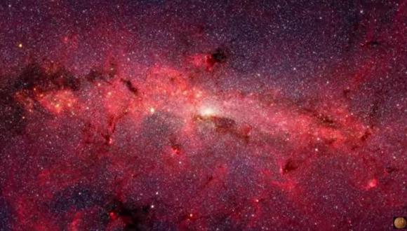 Imagen del centro de la galaxia obtenida con el telescopio espacial Spitzer, donde se pueden ver zonas de Nubes moleculares, entre ellas, la nube en la que se ha descubierto la etanolamina. (JPL/ NASA)