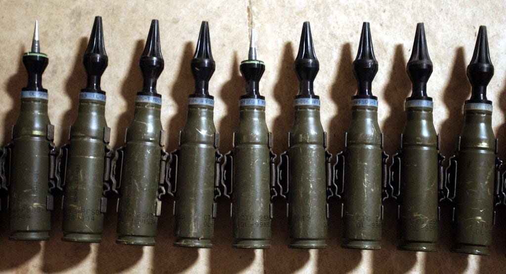 Depleted uranium is used both to make armor plates and ammunition.  Pictured are 25mm rounds used by the US military in Iraq in 2004. The ones the UK will send to Ukraine will be 155mm howitzers. 