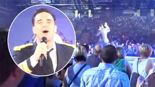 Robbie Williams cayó del escenario y rompió el brazo de una fan