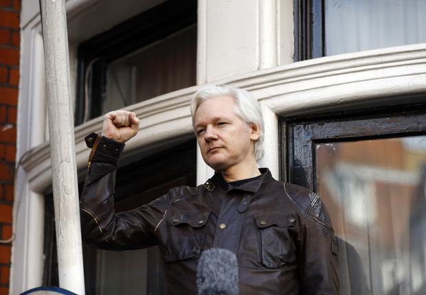 In May 2017, Assange was still in the Ecuadorian embassy in London.  In this image, the Australian comes out to greet his supporters.  (AP Photo / Frank Augstein, File)