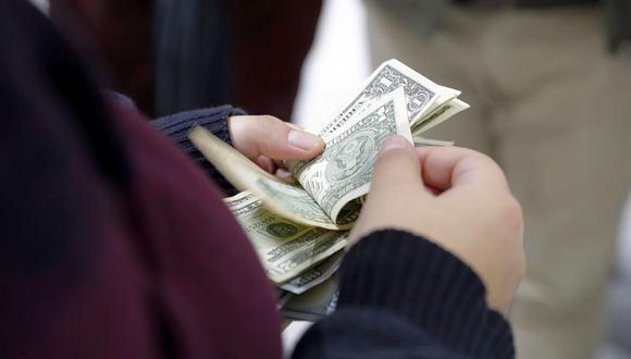 El dólar se vendía en S/ 3.60 en las casas de cambio en horas de la mañana del martes. (Foto: AFP)