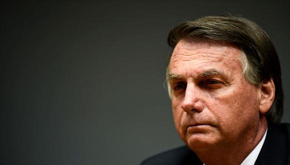 El presidente de Brasil, Jair Bolsonaro, durante una conferencia de prensa con su ministro de Economía, Paulo Guedes, en la sede del Ministerio en Brasilia, el 22 de octubre de 2021. (EVARISTO SA / AFP).