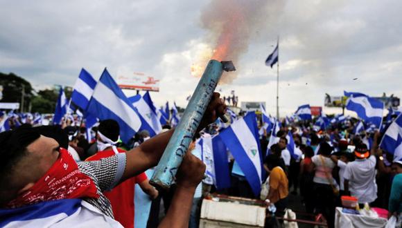 Mientras los estudiantes y la oposición política quieren un cambio inmediato en el poder, los empresarios propugnan una salida gradual de Daniel Ortega y se resisten a convocar a un paro nacional. (Foto: AFP/Inti Ocon)