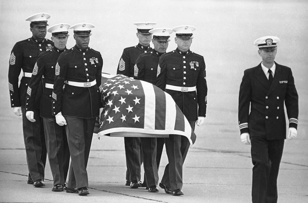 In this March 8, 1985 photo, United States Marines carry the body of slain DEA agent Enrique Camarena Salazar upon arrival at the North Island Naval Air Base in San Diego.  (AP Photo/Lenny Ignelzi, File)