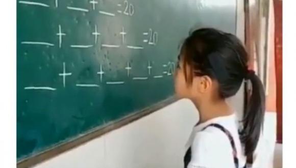 Esta niña se volvió tendencia en Facebook después de mostrar de forma práctica cómo resolver un problema de matemática. (Foto: Captura de Facebook)