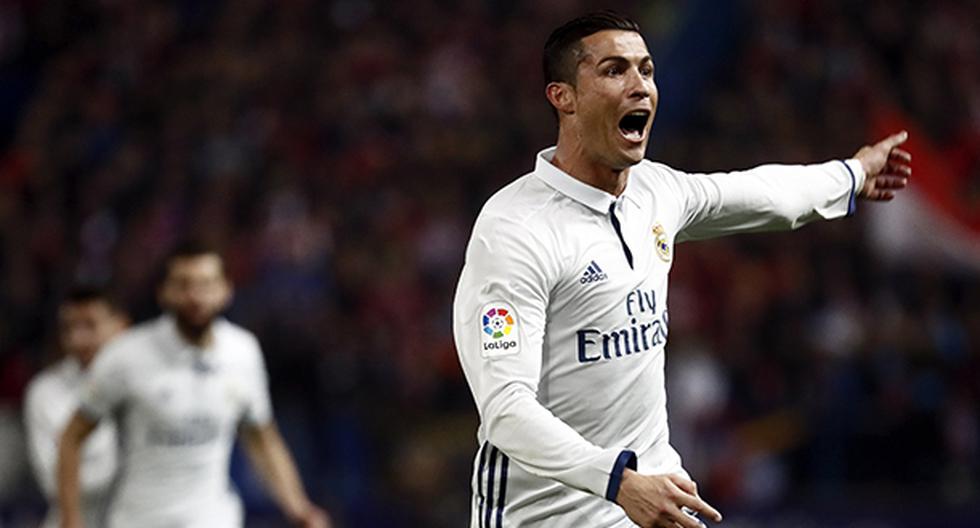 A los 23 minutos, Cristiano Ronaldo logró abrir el marcador del derbi ante Atlético de Madrid. Anotó el 1-0 del Real Madrid de tiro libre. (Foto: EFE)