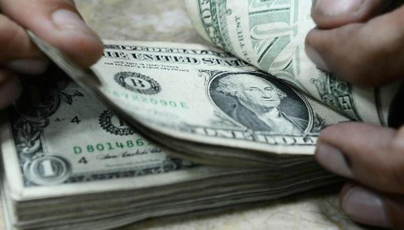 El dólar abrió a la baja en Argentina. (Foto: AFP)