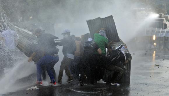 Venezuela: murió un policía durante las protestas en Valencia