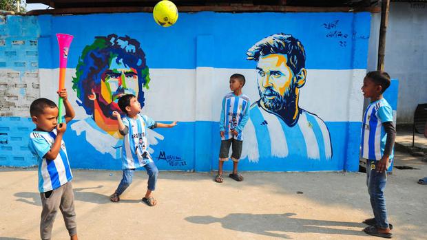 Maradona and Messi, immortalized in a mural in Bangladesh.