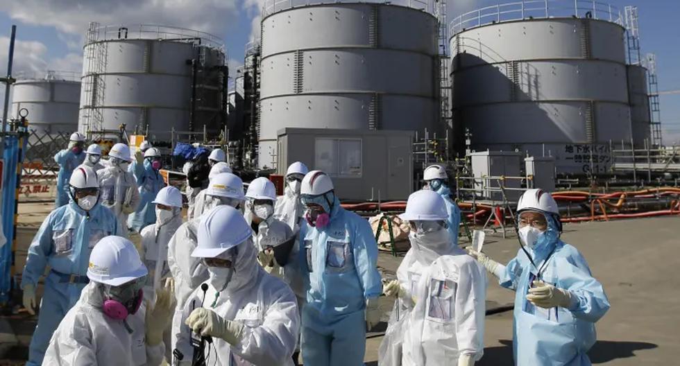 Miembros de los medios de comunicación en la planta de energía nuclear Fukushima Daiichi de Tepco, dañada por el tsunami del 2011 en Japón, en una imagen de febrero del 2016.
(Toru Hanai / Reuters).