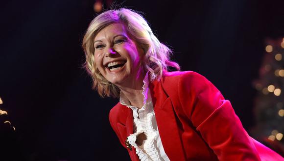 Fotografía de Olivia Newton-John en 2016 durante el Desfile anual de Navidad de Hollywood. La actriz y cantante falleció este 8 de agosto a los 73 años. (Foto: CHRIS DELMAS / AFP)