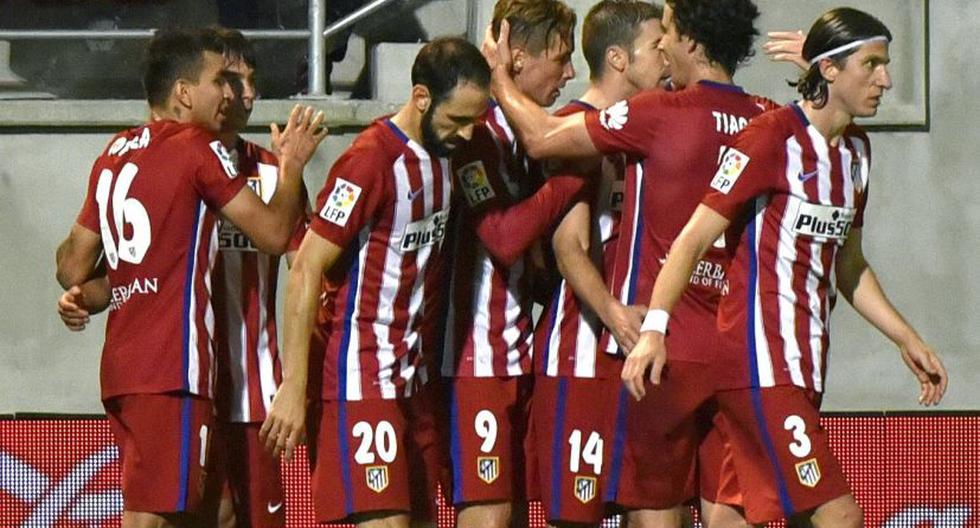 Jugadores del Atlético de Madrid quieren celebrar ante Getafe. (Foto: EFE)