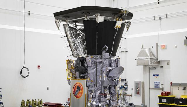 This July 6, 2018 photo made available by NASA shows the Parker Solar Probe in a clean room at Astrotech Space Operations in Titusville, Fla., after the installation of its heat shield. NASA's Parker Solar Probe will be the first spacecraft to "touch