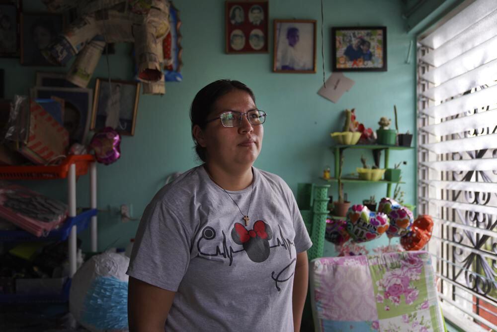 Cindy poses for a photo at her home in San Salvador.  She was imprisoned after losing a baby due to complications during pregnancy.