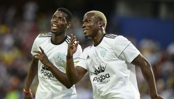 Matias Pogba (R) celebrates his goal with his brother Paul Pogba during a friendly match organized by the Juan Cuadrado foundation between the friends of Colombian midfielder Juan Cuadrado and of French midfielder Paul Pogba at Atanasio Girardot stadium, in Medellin, Antioquia department, Colombia on June 24, 2017. (Photo by JOAQUIN SARMIENTO / AFP)