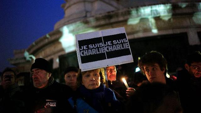 Atentado en Francia: miles rinden homenaje a las 12 víctimas - 1