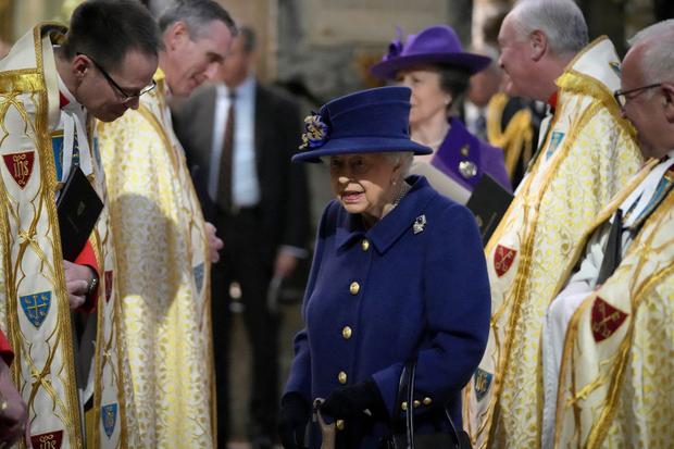 Queen Elizabeth II leaves after attending a Thanksgiving Service at Westminster Abbey.  (FRANK AUGSTEIN / POOL / AFP).