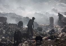 Los haitianos que se ganan la vida en un infernal vertedero de basura | FOTOS