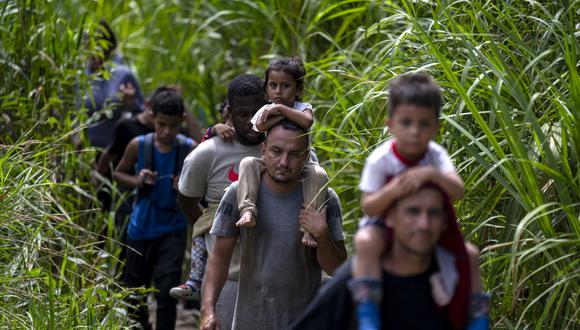 Unos 120.000 menores cruzaron la inhóspita selva del Darién en la frontera entre Colombia y Panamá como parte de un récord de 520.085 Migrantes a Estados Unidos en 2023. (Foto de Luis ACOSTA/AFP)
