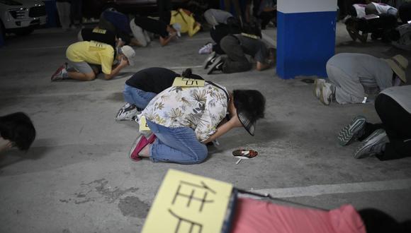 Civiles se refugian durante un simulacro de ataque aéreo en Taiwán. Foto: Sam Yeh / AFP
