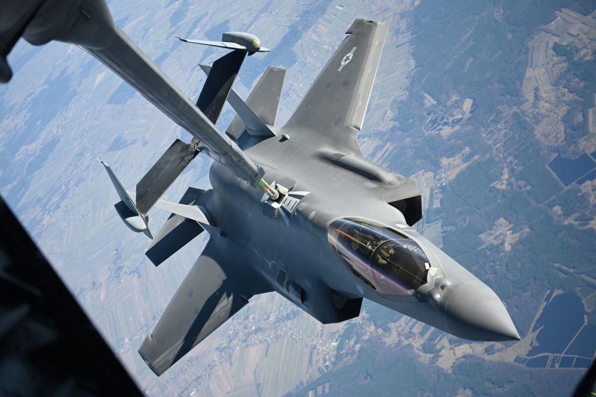 In this file photo taken on February 24, 2022, a US Air Force F-35 Lightning II aircraft is refueled by a KC-10 Extender aircraft over Poland.  (JOSEPH BARRON / US DEPARTMENT OF DEFENSE / AFP).