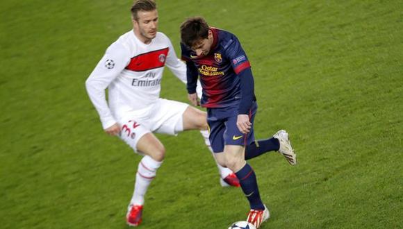 David Beckham y Lionel Messi en un duelo entre el PSG y Barcelona. (Foto: AFP)