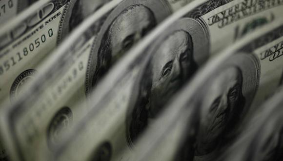 El precio del dólar bajó a 19.635,41 bolívares soberanos por billete verde en el mercado paralelo. (Foto: Reuters)