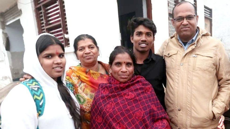 Neetu Kumari with her children and activist Naresh Paras after their reunion.  (NARESH PARAS).