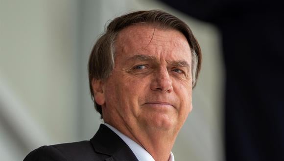 Fotografía de archivo que muestra al presidente de Brasil, Jair Bolsonaro, mientras participa en la ceremonia del Gran Reemplazo de la Guardia Presidencial, en el Palacio do Planalto en la ciudad de Brasilia. (EFE/ Joédson Alves ARCHIVO).