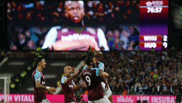 West Ham United consiguió su primer triunfo en la Premier League sobre Huddersfield Town. Los goles fueron anotados por Pedro Obiang y André Ayew. (Foto: AP)