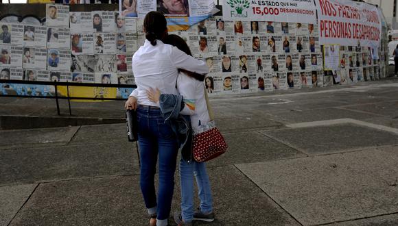 Familiares de personas desaparecidas participan en una manifestación durante el Día Internacional de los Desaparecidos en Guadalajara, estado de Jalisco, México, el 30 de agosto de 2022. (Foto de ULISES RUIZ / AFP)