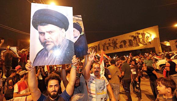 La coalición del clérigo radical Muqtada al-Sadr encabeza el primer recuento parcial en Iraq. (Foto: AP/Hadi Mizban)