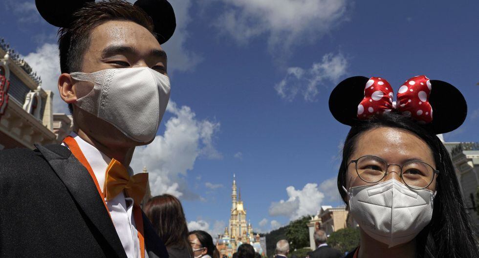 Visitantes son captados usando máscaras faciales para prevenir la propagación del nuevo coronavirus en el parque temático de Disney en Hong Kong. <a href='https://anglicky-klub.com/59319196/'>تنزيل العاب اون لاين</a>  (AP/Kin Cheung).» /></picture></div>
<p class=