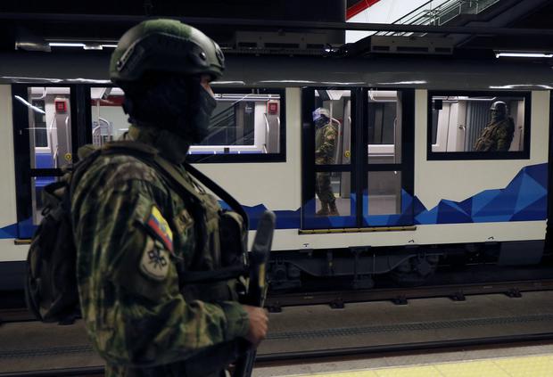 Ecuadorian security forces patrol the El Labrador metro station in Quito on January 10, 2024.  (Photo by STRINGER/AFP).