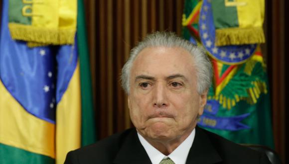 La situación de Temer cambió el 1º de enero, cuando dejó de beneficiarse de los fueros políticos y sus casos pasaron a manos de tribunales de primera instancia. (EFE)