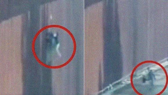 Las cámaras registran el momento exacto en el que el contrabandista desciende con la niña por el muro. (Captura de video).